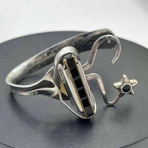 Clyde Edward Casey Inscribed Script Harmonica Cuff Bracelet Adjustable